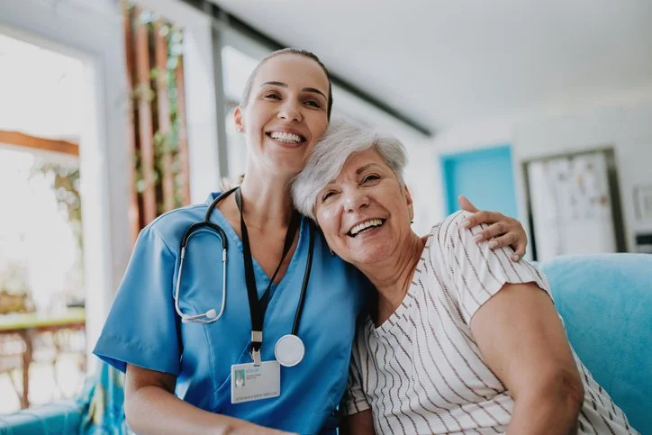 Healthcare professional speaking with a patient
